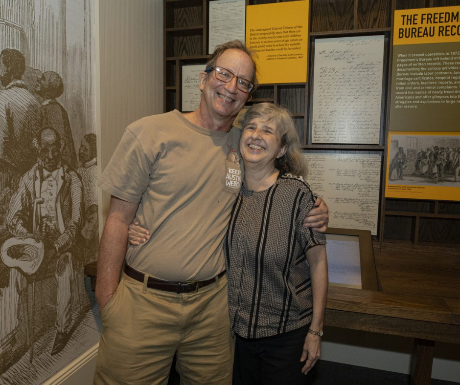 TC Volunteer Jennie Caughran and her husband, Randy Hamilton, visiting the "Make Good the Promises: Reconstruction and Its Legacies" 2022 exhibition at NMAAHC.